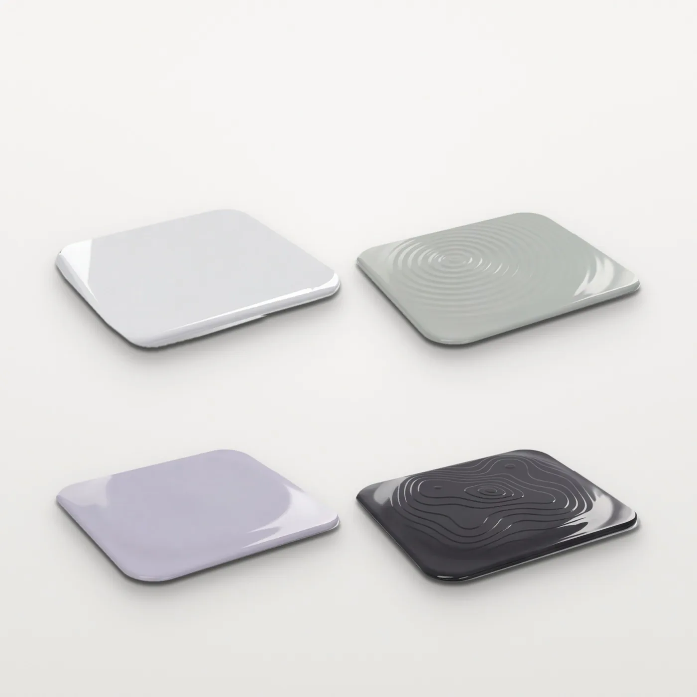 Four Boo charms: White, Ripple Sage, Stone Lilac and Topo Black.